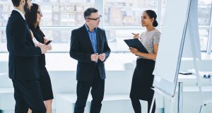 a diverse group of professionals having a discussion